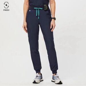 FIGS High Waisted Zamora FREEx Lined
Jogger Scrub Pants in navy blue, size XS